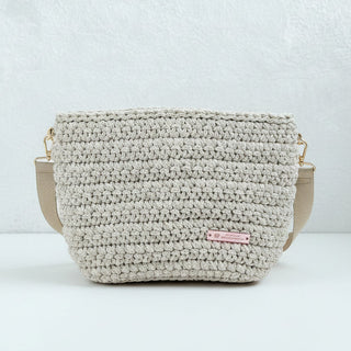 Handmade crochet crossbody bag in shiny ivory color.